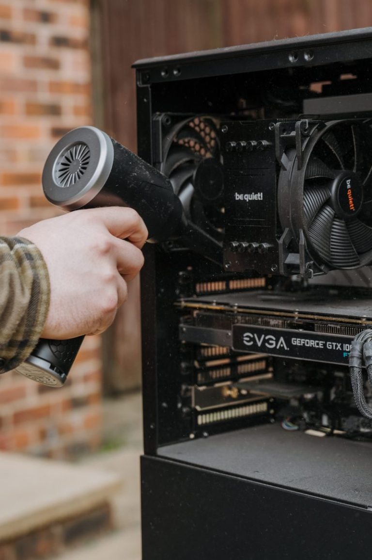Dusty laptop cooling vents that need cleaning with compressed air