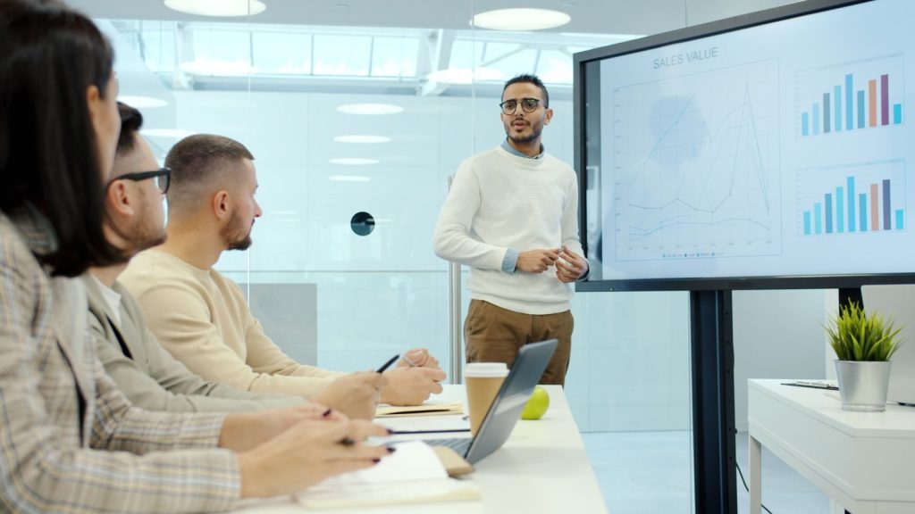 Sales team reviewing AI-generated lead insights.