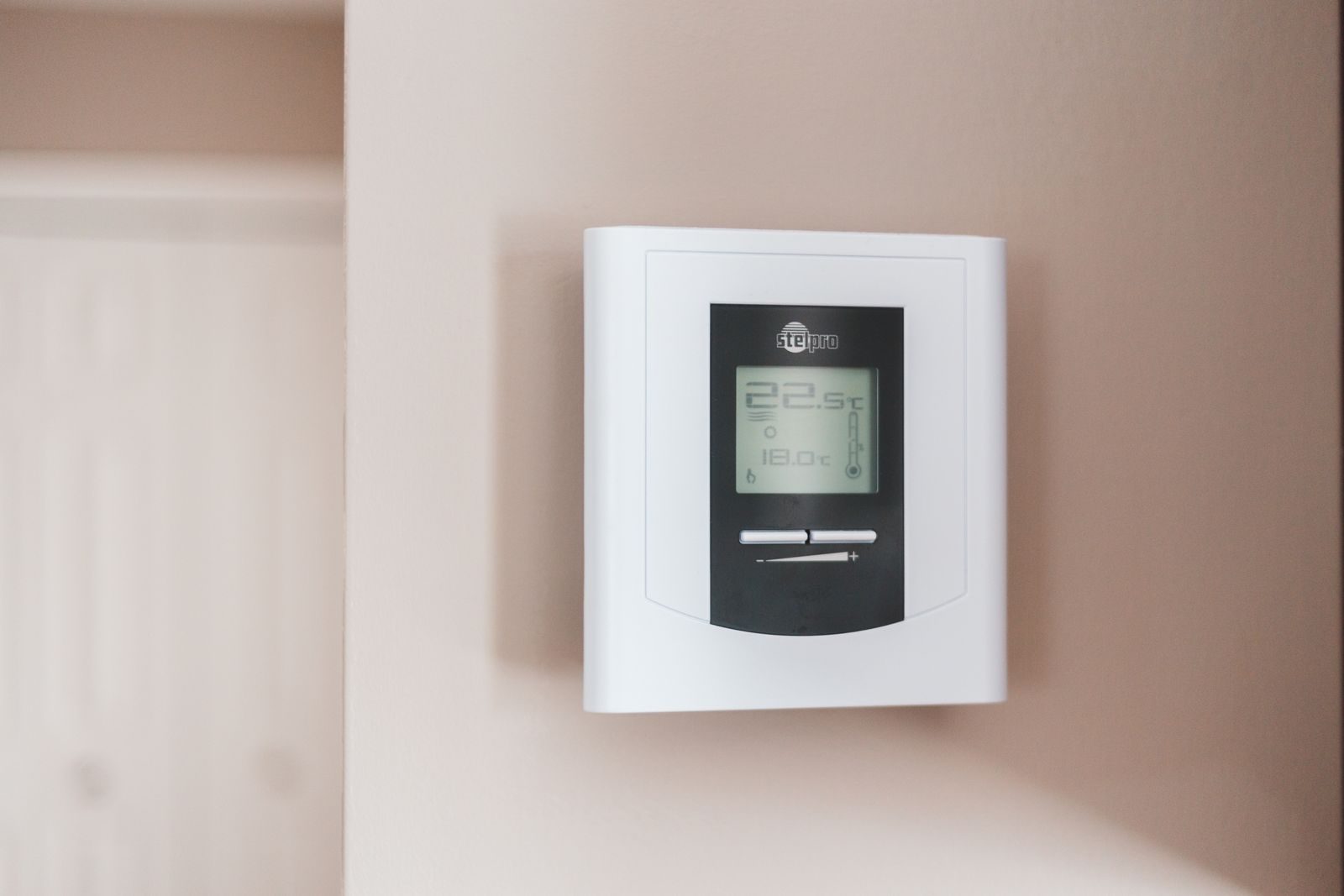 Comparing smart thermostat displays side by side.