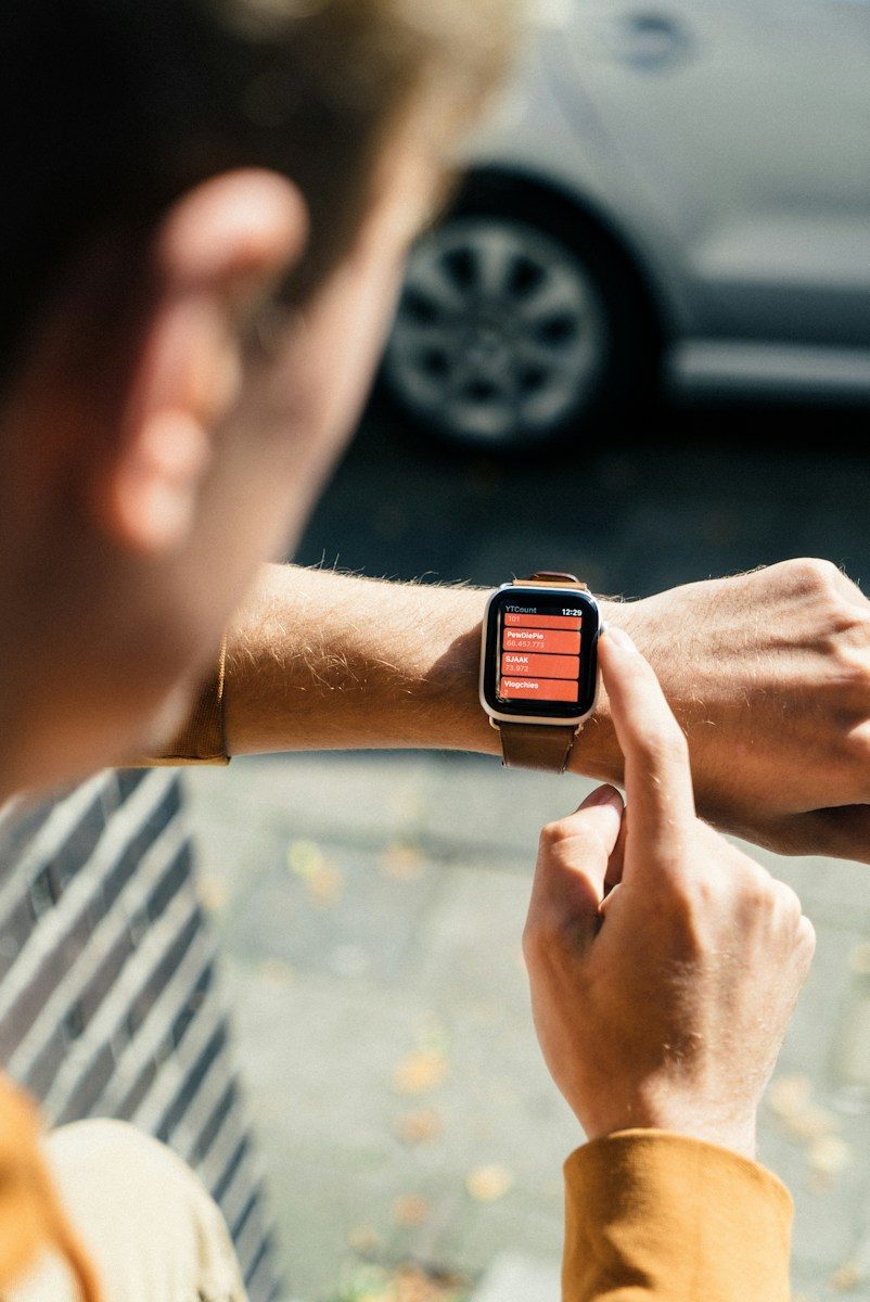 Runner checking an affordable smartwatch during a morning run