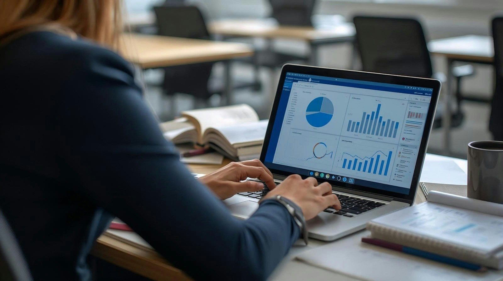 Marketer reviewing AI marketing software campaign results on a laptop